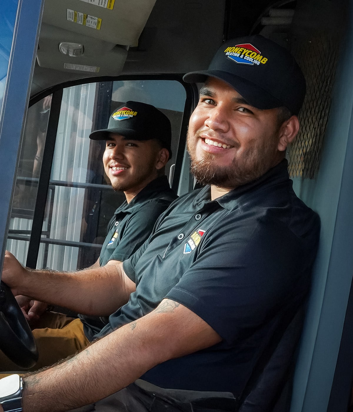 two Honeycomb -technicians-inside-van