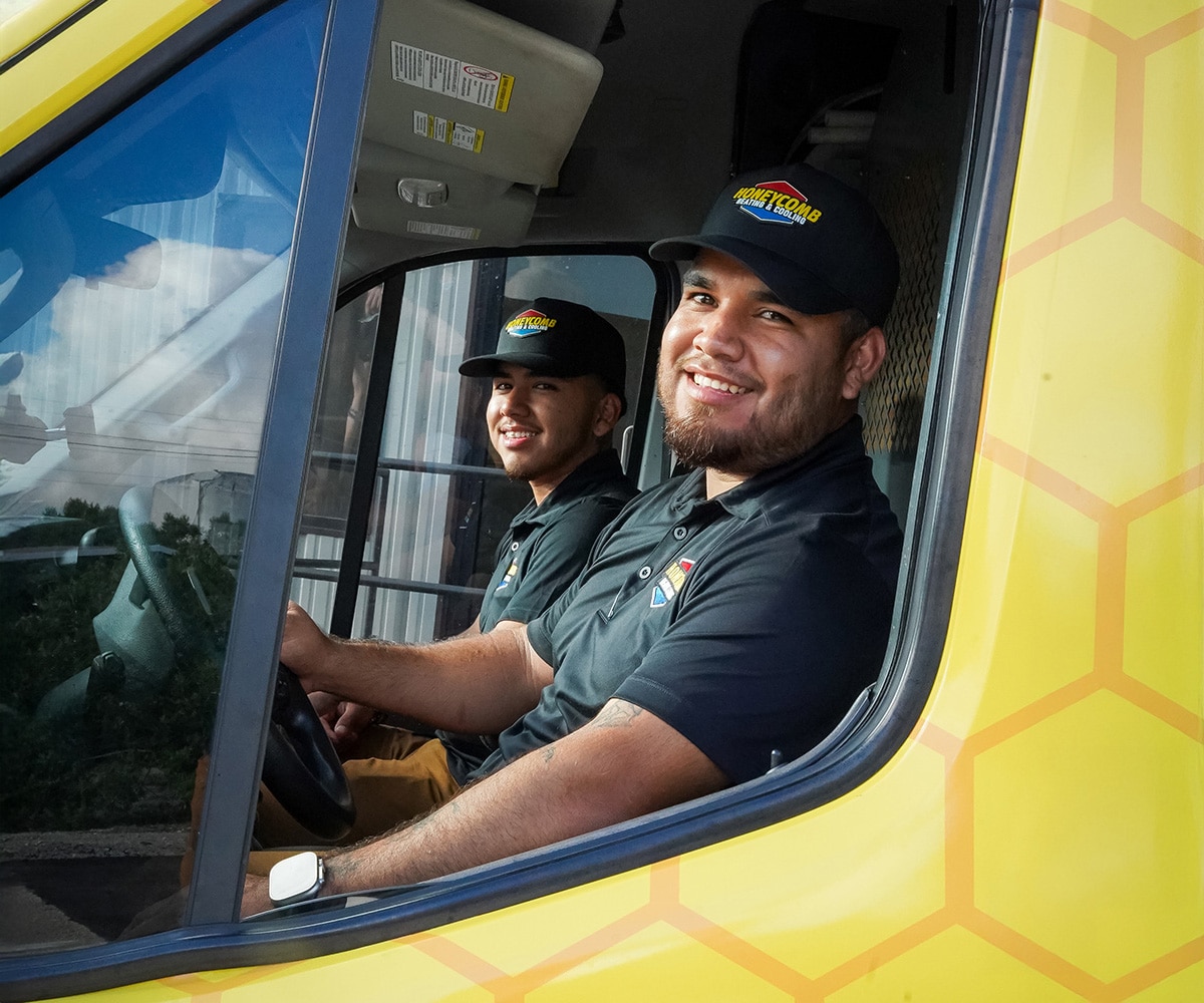 two Honeycomb -technicians-inside-van