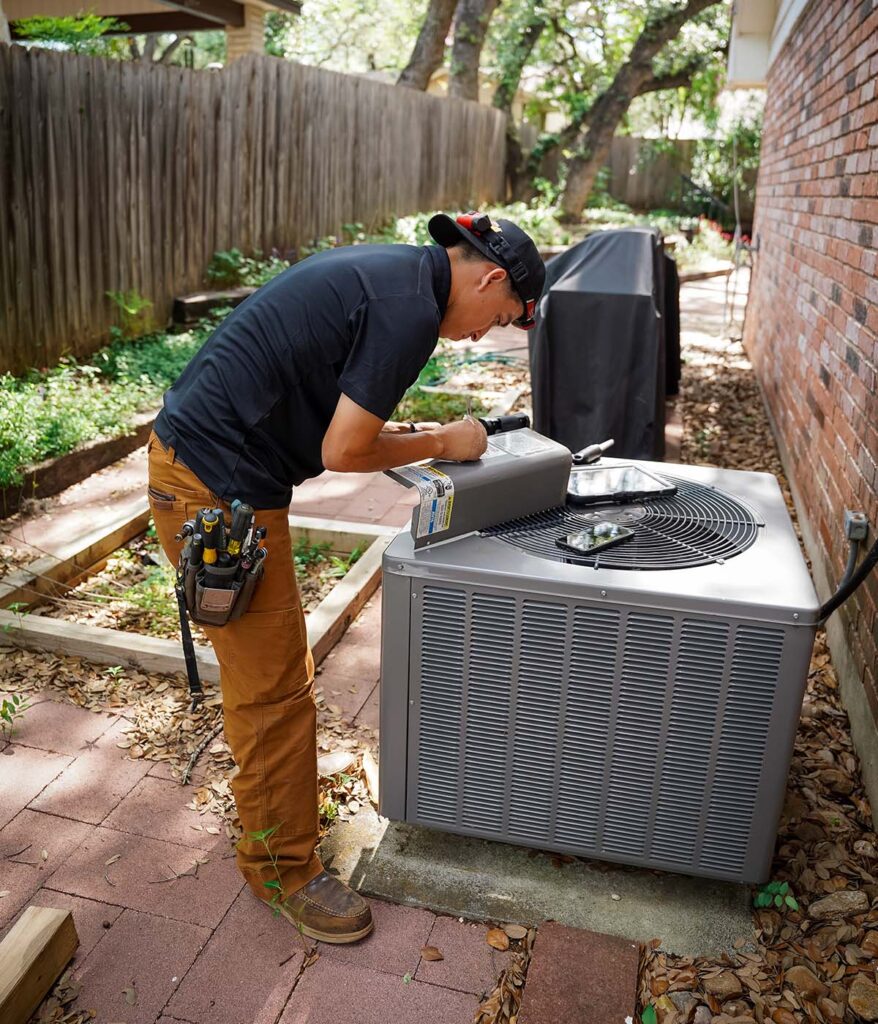 Accuracy is the foundation of a long-lasting AC repair. This image shows a Honeycomb professional meticulously documenting system data during a service visit. By focusing on the small details and maintaining clear records, we ensure that every AC repair we perform meets the highest standards of safety and efficiency for our clients.