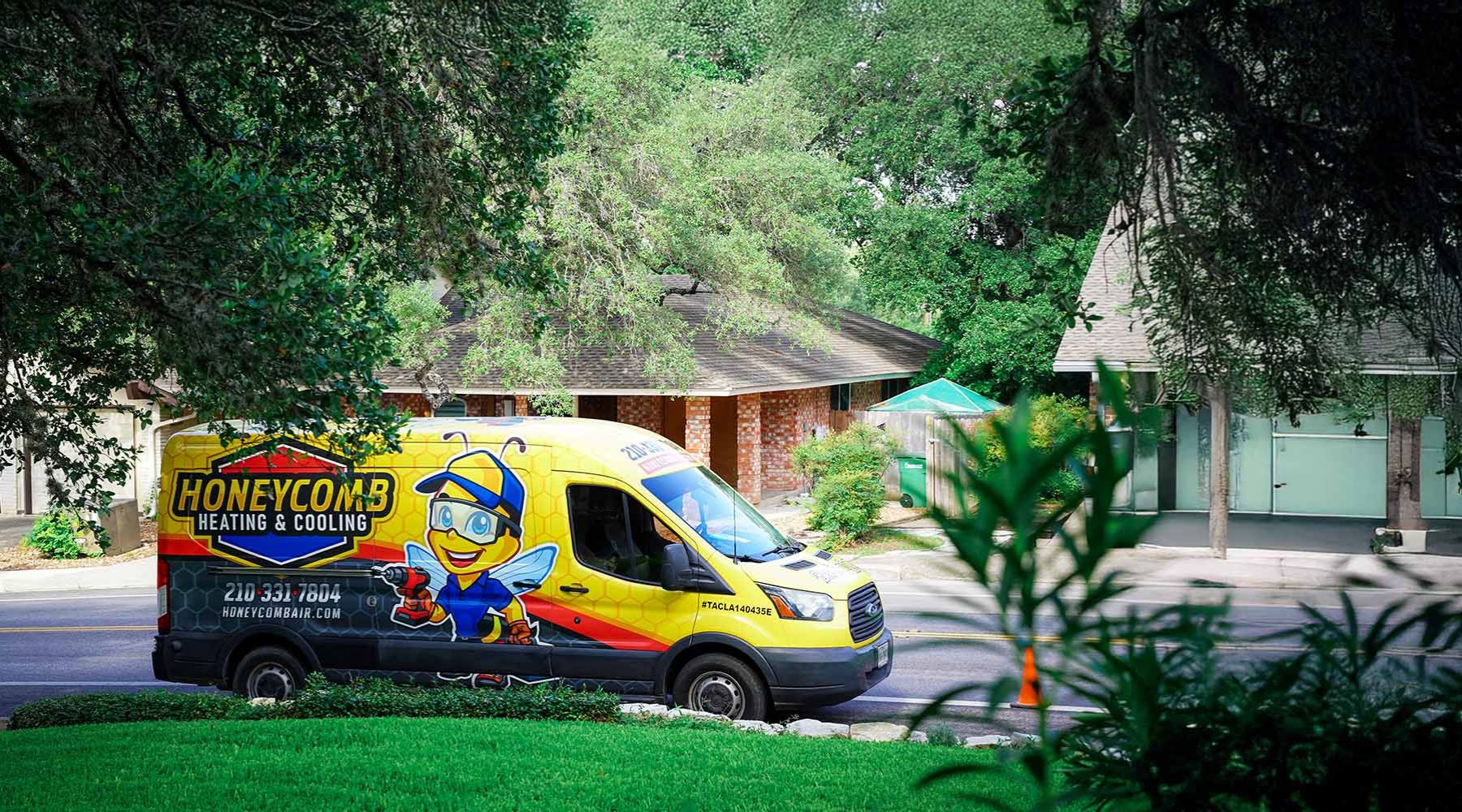 This image shows a Honeycomb Heating & Cooling service van parked in a Shavano Park, TX neighborhood, highlighting local AC repair and HVAC maintenance services.