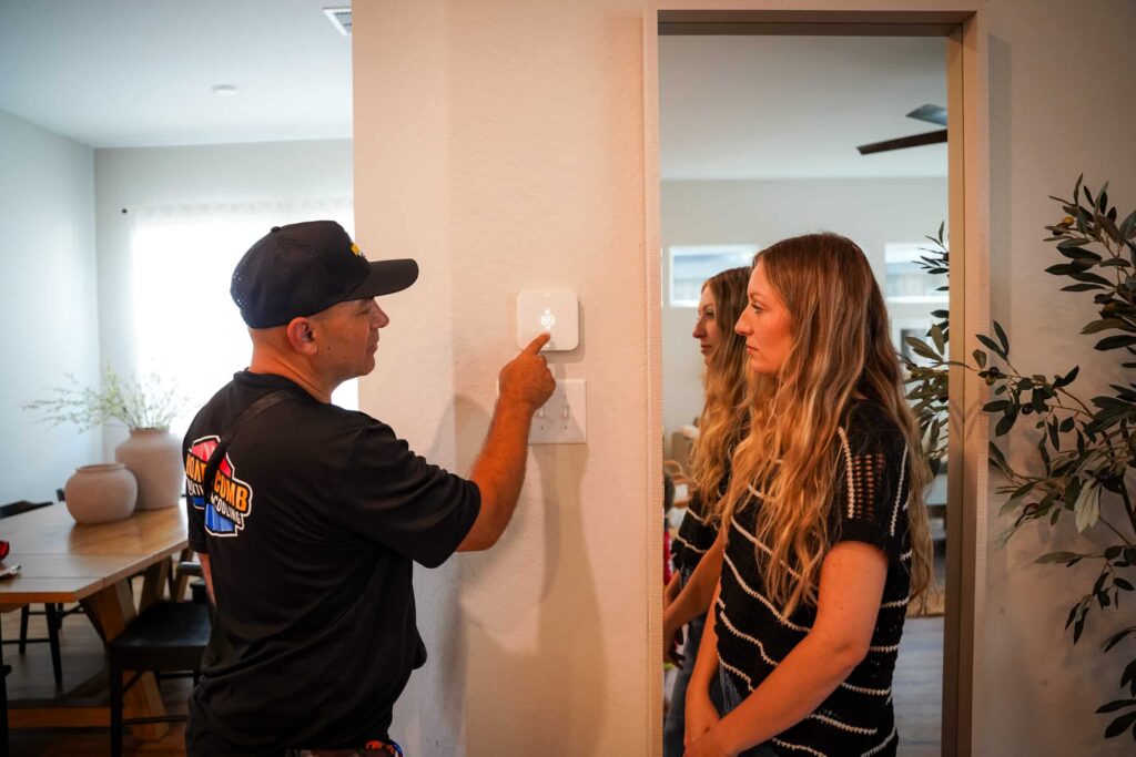 Smart thermostat installation in Live Oak TX home by Honeycomb technician