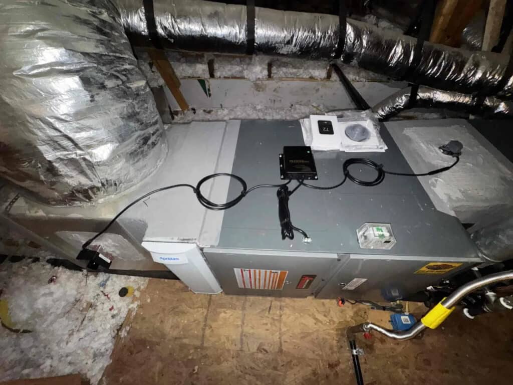 Attic air handler installation with an AprilAire filter cabinet and indoor air quality components for a two-stage vs inverter ac San Antonio evaluation, by Honeycomb.
